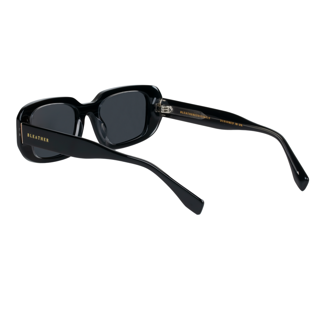 Iconic: Lunettes de soleil de luxe Noir-Trans